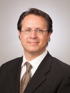 Mark E. Howshar, M.D.